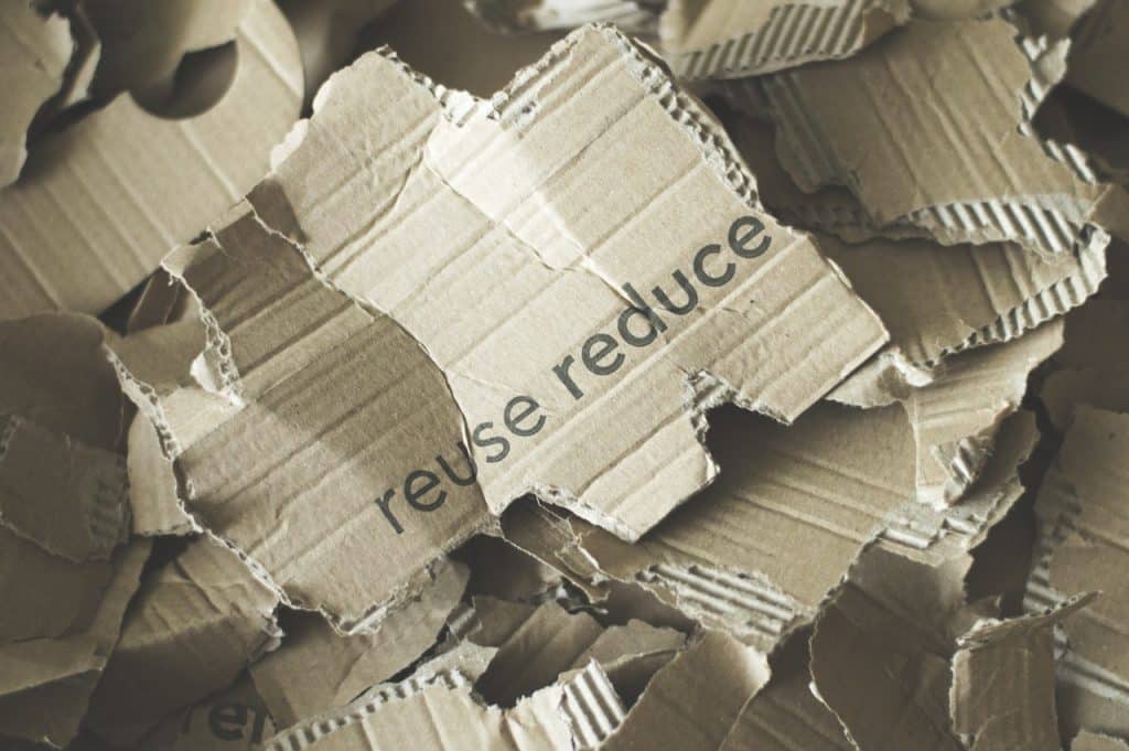 Reuse Reduce Written On Cardboard Box