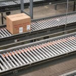 Package On A Gravity Roller Conveyor