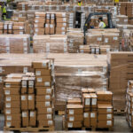 Piles Of Boxes In a Warehouse